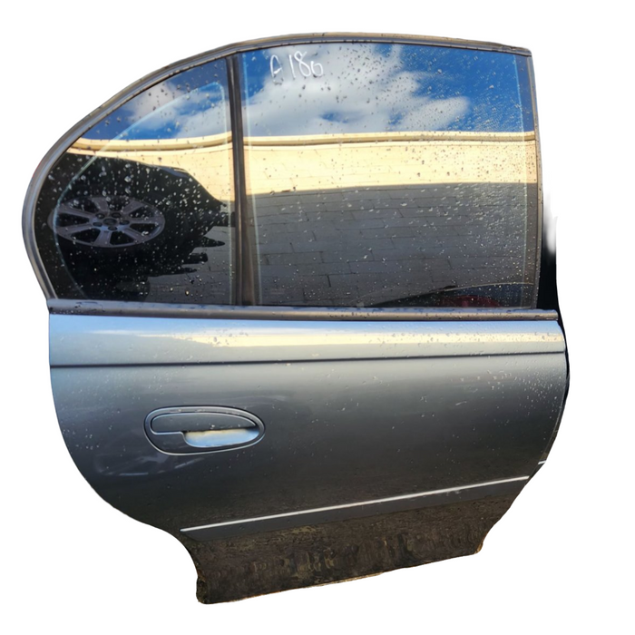 A180 - VZ V6 HOLDEN COMMODORE SEDAN - DRIVERS REAR DOOR - PAINT CODE ODYSSEY #276m