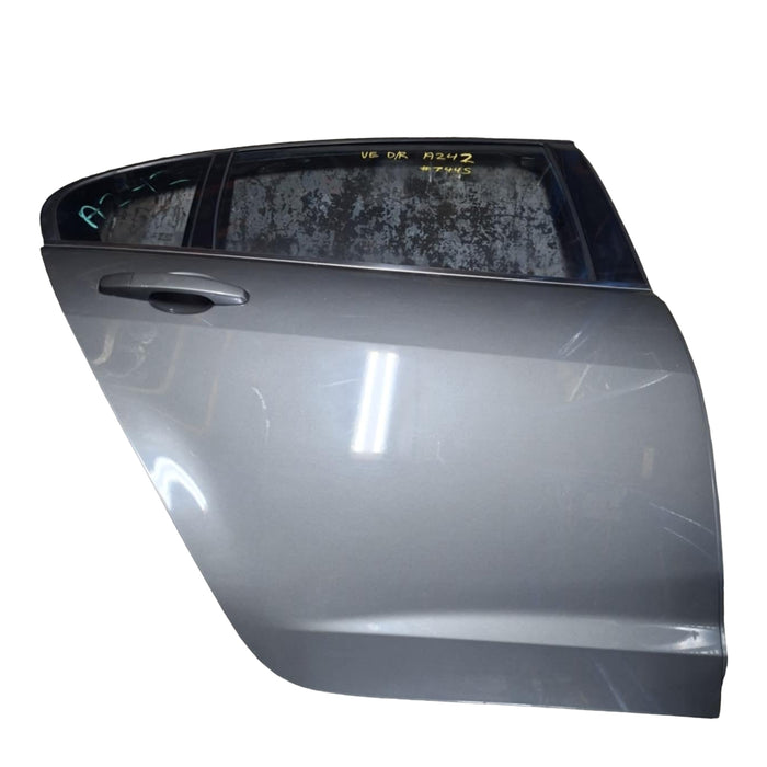 A242 - VE HOLDEN COMMODORE SEDAN - Door (DRIVER'S REAR) ALTO GREY #744S