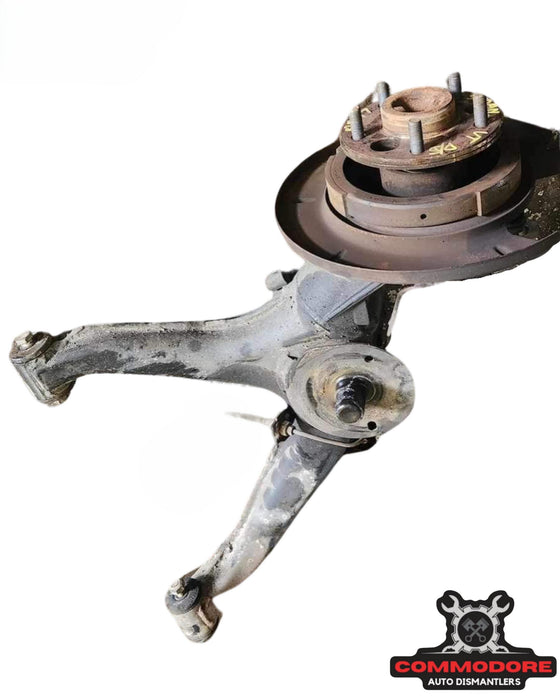 VP/VQ IRS REAR LOWER CONTROL ARM WITH HUB ASSEMBLE - Driver Side