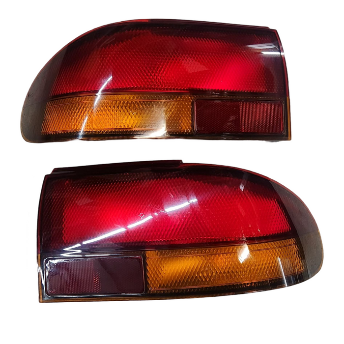 VR/VS HOLDEN COMMODORE SEDAN TAILLIGHTS SET - RED/AMBER (NEW)