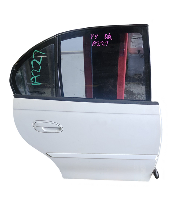 A227 - VY EQUIPE SEDAN - Driver's Rear Door - PAINT CODE HERRON WHITE #679F