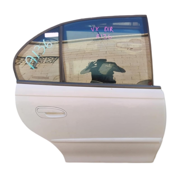 A136 - VX HOLDEN COMMODORE SEDAN - DRIVER'S REAR DOOR - PAINT CODE HERON WHITE #J073