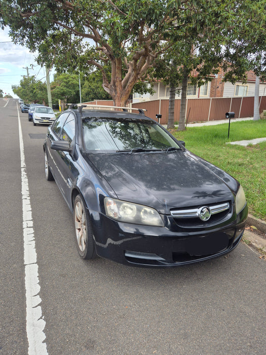 a313 - VE Holden Commodore Sedan - Prorack Lockable Roof racks (set with key)