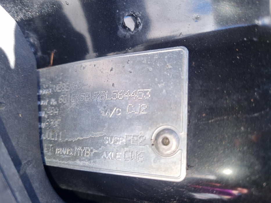 A207 - VE HOLDEN COMMODORE Sedan - Fuel Flap PHANTOM BLACK #690F