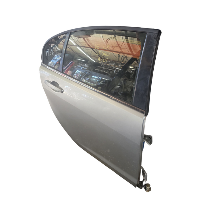 A264 - VE HOLDEN CALAIS - Door (DRIVER'S REAR) SWITCHBLADE SILVER #636R