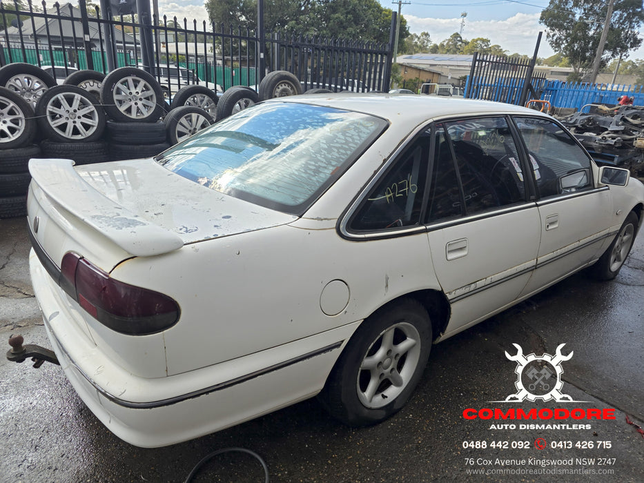 A276 - VS HOLDEN COMMODORE SEDAN - Fuel Flap ALASKAN WHITE #J064
