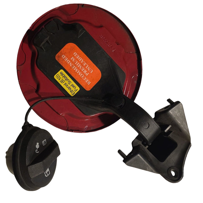 A033 - VE HOLDEN COMMODORE SEDAN - FUEL FLAP - STING RED #687F