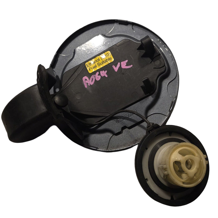 A064 - VE HOLDEN COMMODORE SEDAN - FUEL FLAP - ODYSSEY #276M