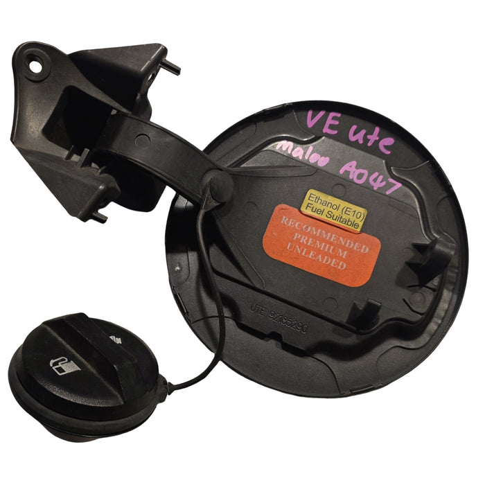 A047 - VE HOLDEN COMMODORE UTILITY - FUEL FLAP - PHANTOM BLACK #690F