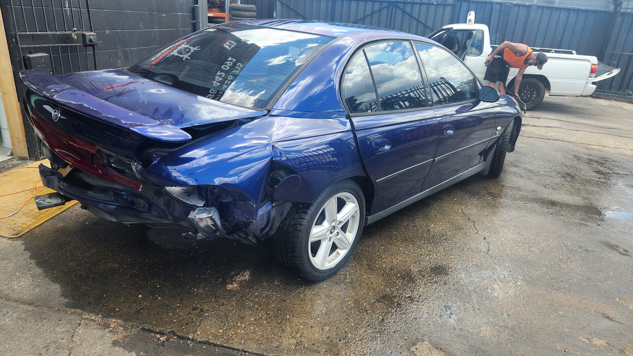 A104 - VT HOLDEN COMMODORE II V6 - SEDAN - DRIVERS REAR DOOR - PAINT CODE BERMUDA BLUE #B168