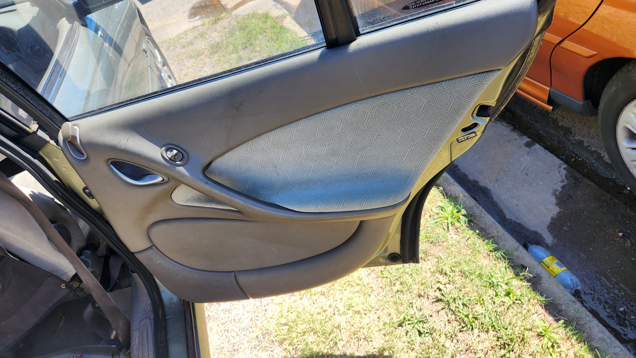 VT / VX Holden Commodore - DRIVER'S SIDE - Kick Panel / Beige Cloth - Part #92047030
