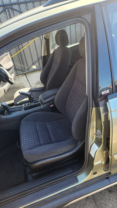 A127 - VT,VX,VY.VZ HOLDEN COMODORE / ADVENTRA WAGON - Seatbelt Passengers Rear (black) with Beige Plastic Bezel Trim