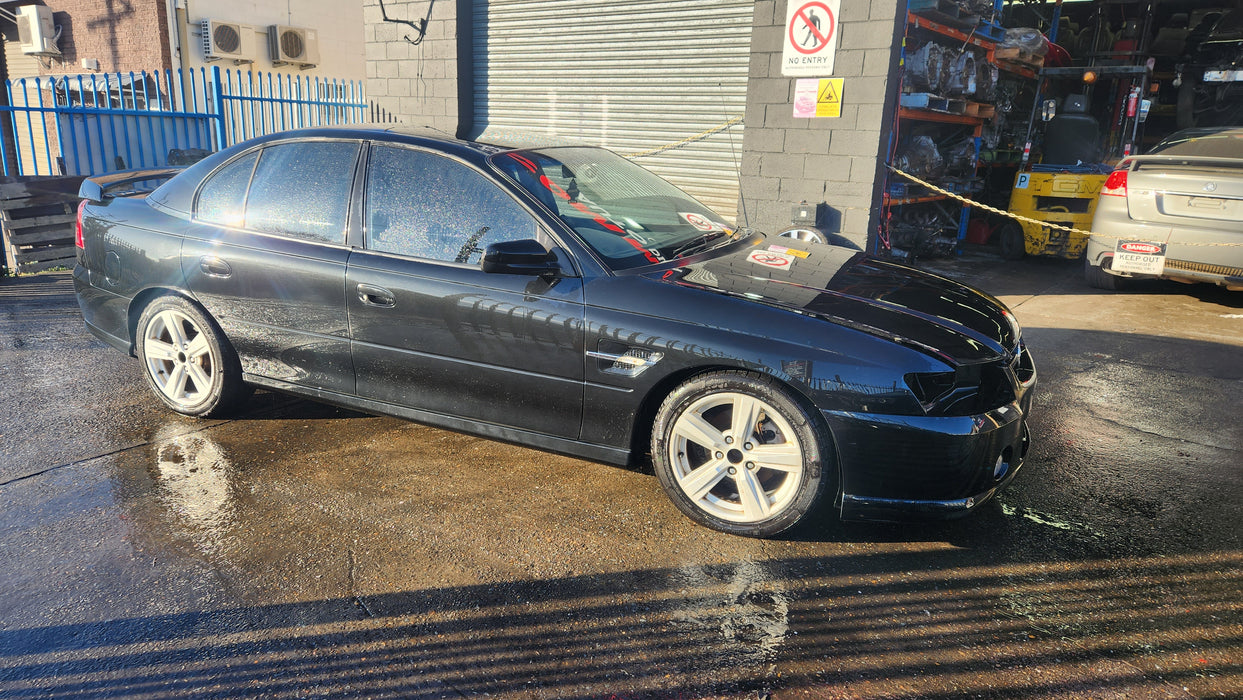 A155 - VZ V6 HOLDEN COMMODORE SEDAN - PASSENGER REAR DOOR - PAINT CODE PHANTOM BLACK #690F