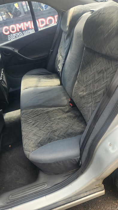 A157 - VX, VY, VZ, VT HOLDEN COMMODORE SEDAN - Driver's Rear Seatbelt (Black) with Beige Plastic Bezel trim