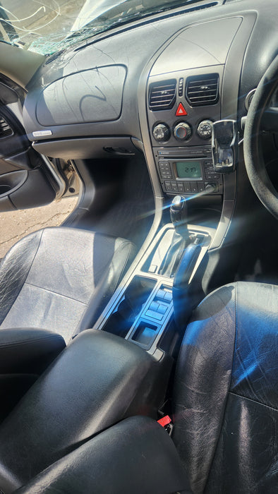 A164 - VY / VZ HOLDEN COMMODORE - Centre Console Trim - Manual / Auto Silver