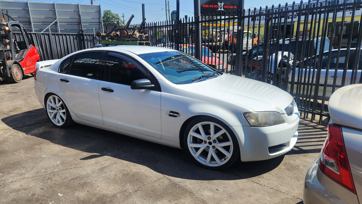 A167 - VE COMMODORE HOLDEN SEDAN- DOOR PASSENGER REAR - HERRON WHITE PAINT CODE #679F