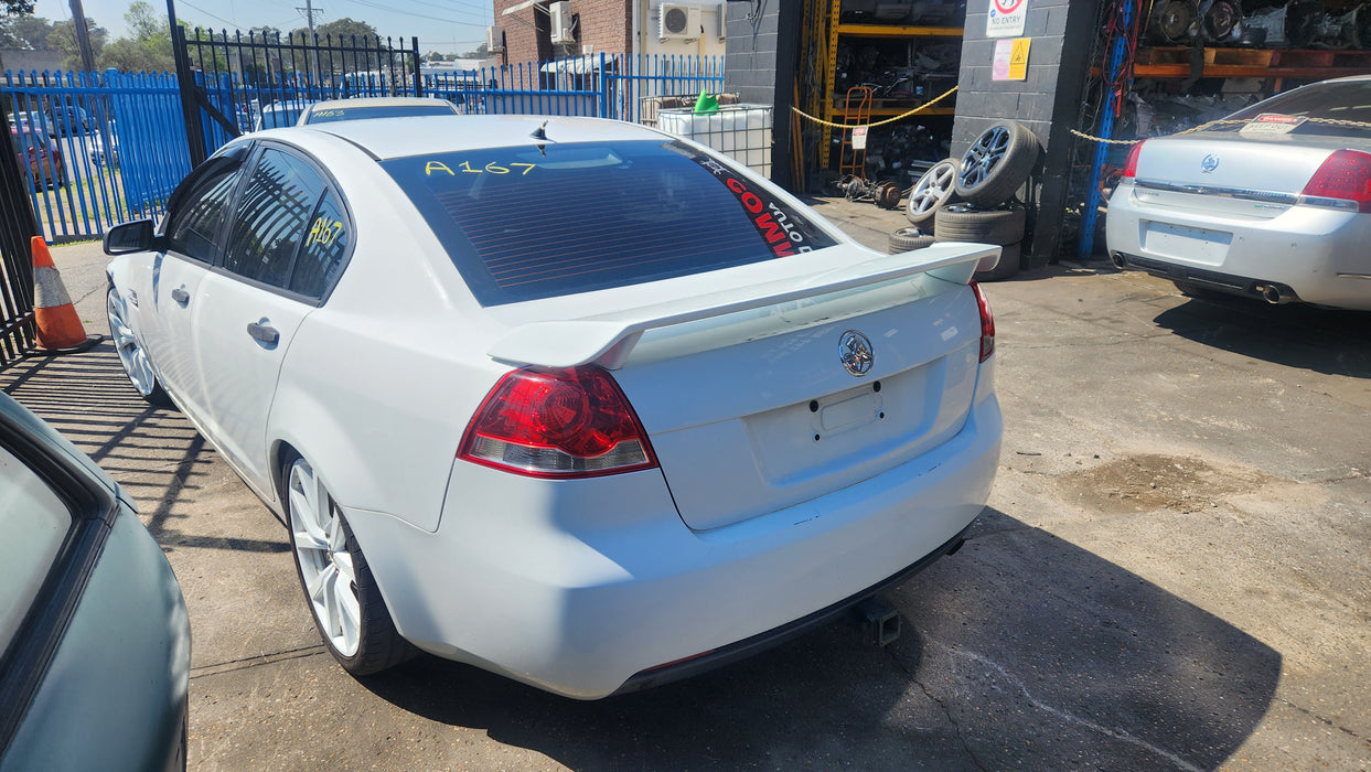 A167 - VE COMMODORE HOLDEN SEDAN- DOOR PASSENGER REAR - HERRON WHITE PAINT CODE #679F