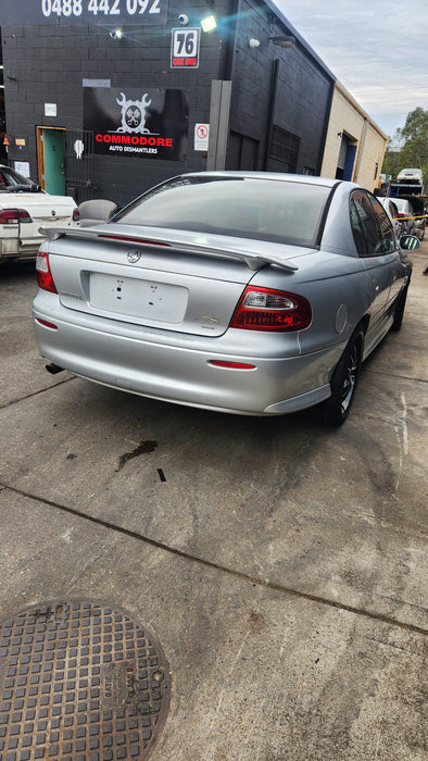 A168 - VY, VZ, VT, VX HOLDEN COMMODORE SEDAN - Seatbelt centre Rear (Black) with plastic bezel