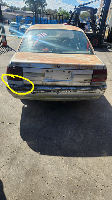 A169 - VN Holden Commodore Sedan - Rear Lower Quarter Body Trim  Passengers Side - Petina  ASTROID SILVER #2J013