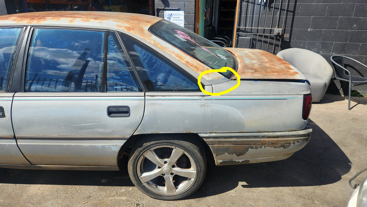 A169 - VN Holden Commodore Sedan - Rear Upper Quarter Body Trim - Passengers Side - ASTROID SILVER #2J013