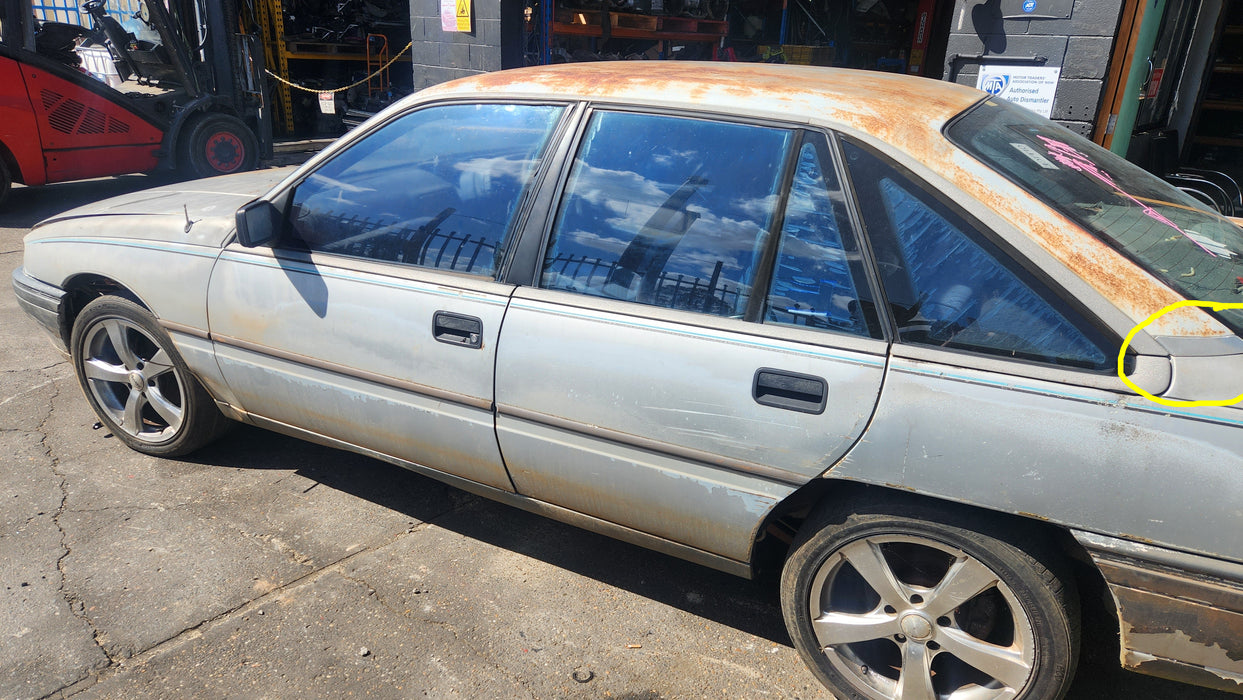A169 - VN Holden Commodore Sedan - Rear Upper Quarter Body Trim - Passengers Side - ASTROID SILVER #2J013