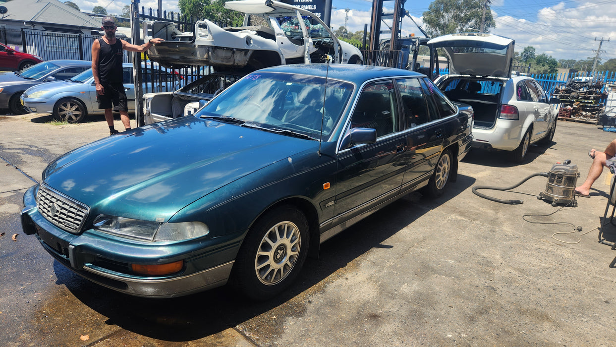 A178 - VR HOLDEN STATESMAN - Driver's Rear Door - PAINT CODE SHERBROOK GREEN #C061