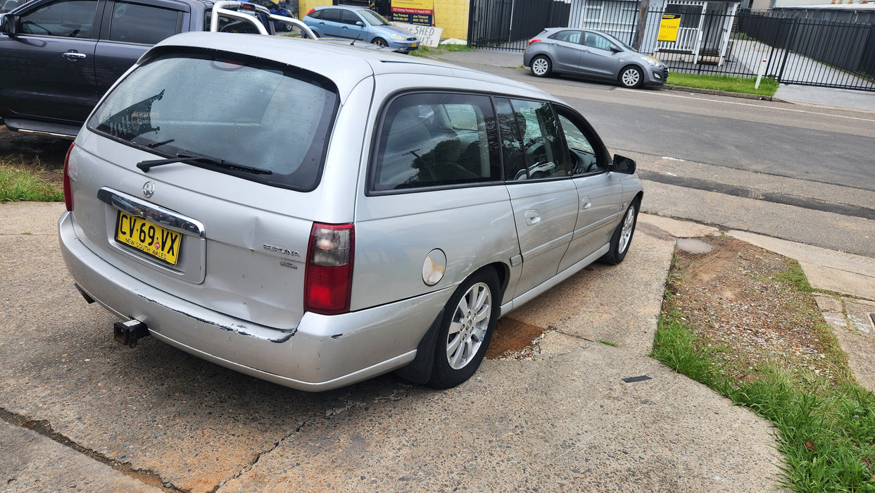 A181 - VT,VX,VY.VZ HOLDEN COMODORE WAGON- Seatbelt Drivers Rear (black)