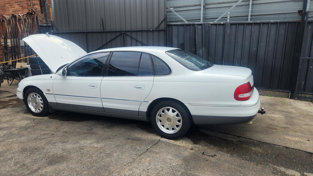 A184 - WH Holden Statesman/Caprice - Passenger Rear Lower Trim Panel - HERON WHITE #J03N