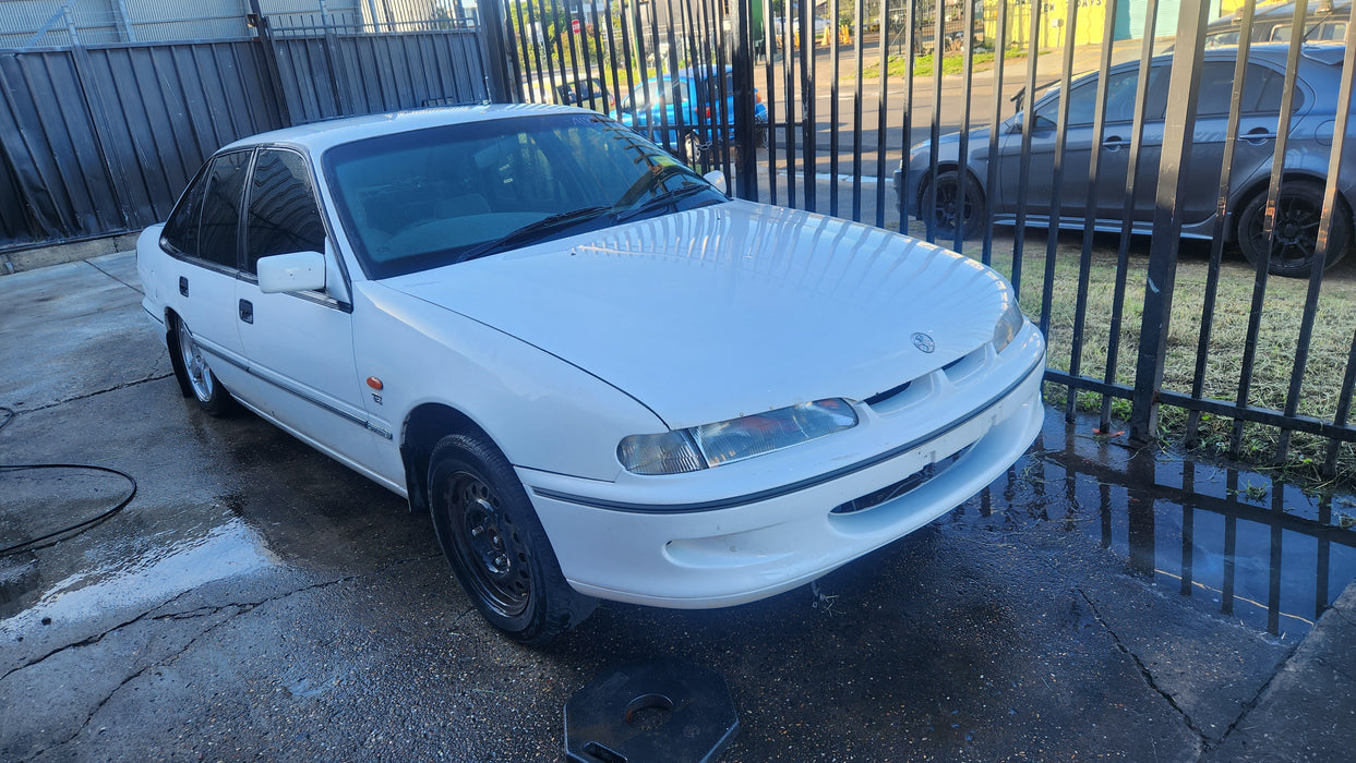 A187 - VS Holden Acclaim Sedan - Fuel Flap - HERON WHITE #679F