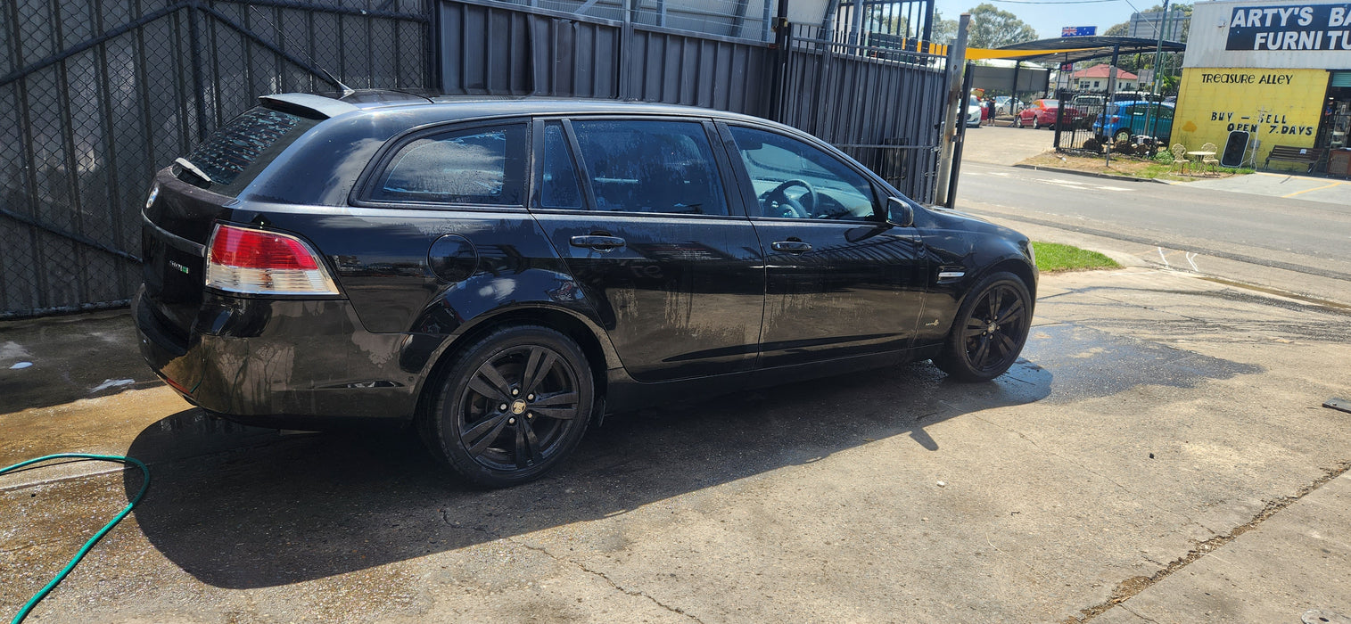 A189 - VE HOLDEN COMMODORE WAGON - Door Driver Front - Phantom Black #690F