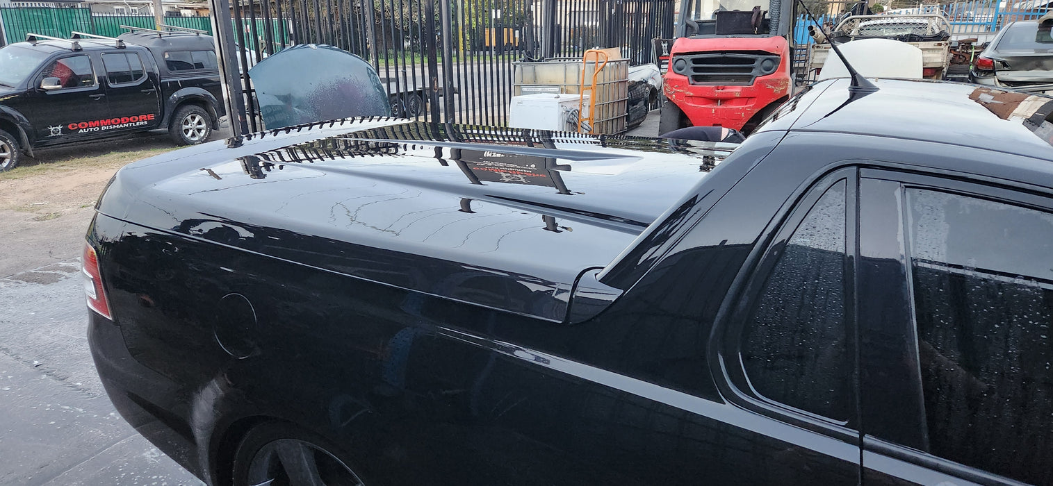 A203 - VE SV6 HOLDEN COMMODORE UTE - FUEL FLAP PHANTOM BLACK #6905