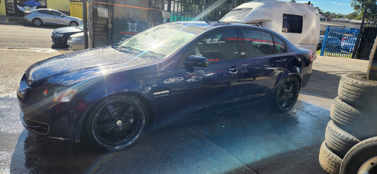 A213 - VE HOLDEN COMMODORE OMEGA SEDAN - Fuel Flap VESPERS BLUE #718h