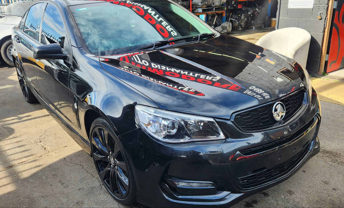 A218 - VF HOLDEN COMMODORE SV6 - Fuel Flap PHANTOM BLACK #690F