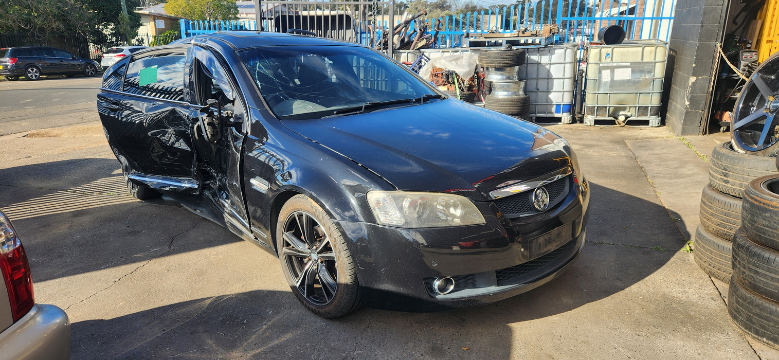 A226 - VE HOLDEN COMMODORE SEDAN - Door Passenger FRONT - PHANTOM BLACK #690F
