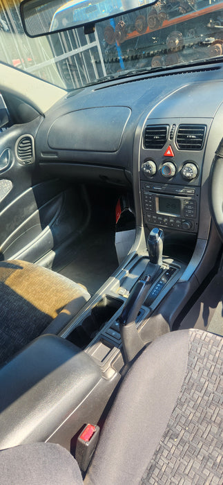 A227 - VY / VZ HOLDEN COMMODORE - Centre Console Trim - Manual / Auto Silver