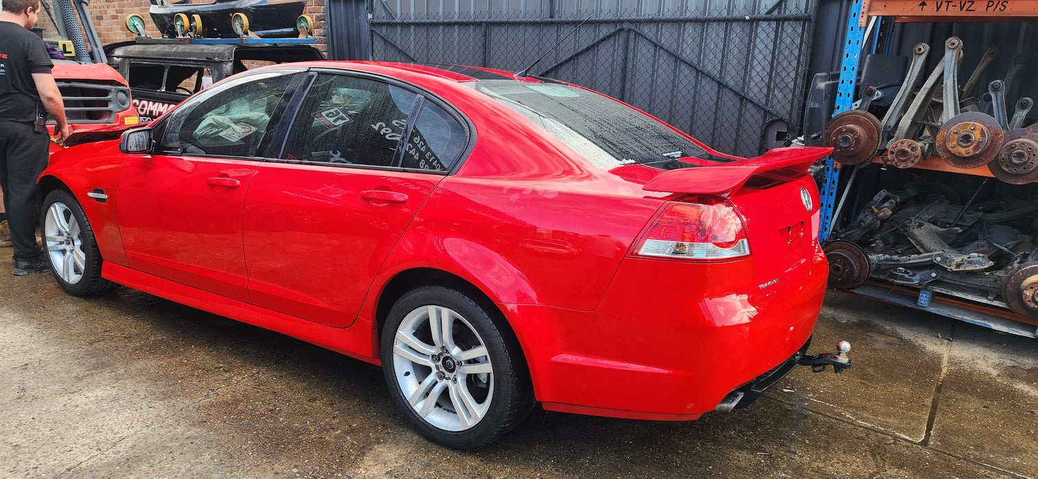 A228 - VE SV6 Holden Commodore SEDAN - Sideskirt (Pair) Sting Red