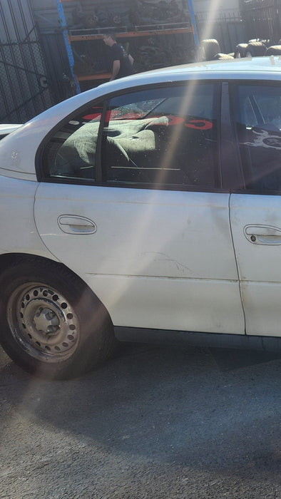 A231 - VT / VX Holden Commodore SEDAN - Rear Driver's Door (POWER WINDOWS) - HERON WHITE #J023