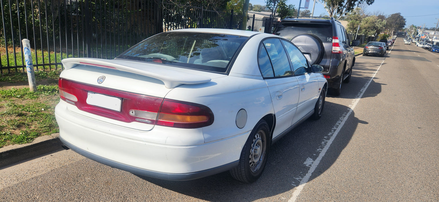 A231 - VT SERIES I Holden Commodore SEDAN - Bootlid w/ Brake Light Spoiler - HERON WHITE #J023