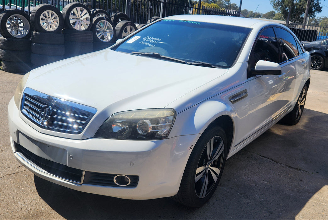 A224 - WM HOLDEN STATESMAN SEDAN - Fuel Flap HERON WHITE #679F
