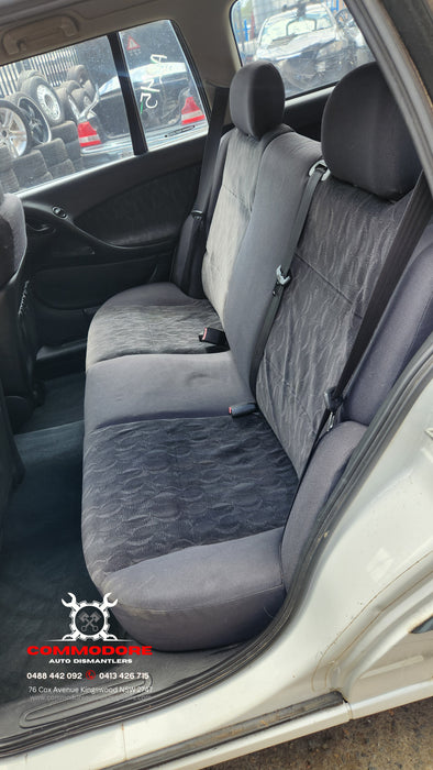 A245 - VT,VX,VY.VZ HOLDEN COMODORE / ADVENTRA WAGON - Seatbelt Passengers Rear (black) with Beige Plastic Bezel Trim
