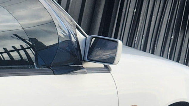 A257 - VS Holden Commodore SEDAN - Side Mirror (POWERED) Driver's Side - ALASKAN WHITE #J064