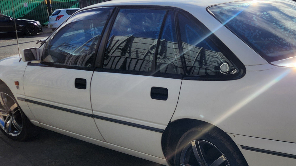 A257 - VS Holden Commodore SEDAN - Rear Door (MANUAL WINDOW) Passenger's Rear - ALASKAN WHITE #J064