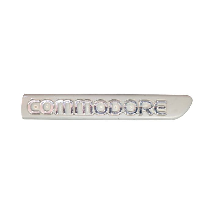 VS HOLDEN COMMODORE GUARD BADGE - "COMMODORE" Drivers Guard Badge