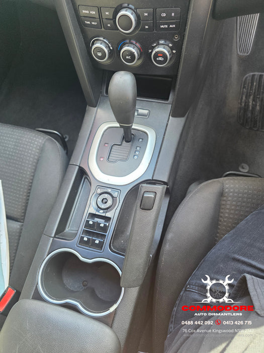 A279 - VE SV6 Holden Commodore SERIES I - Centre Console Trim with  Window & Traction Control Switch AUTO - BLACK / SILVER