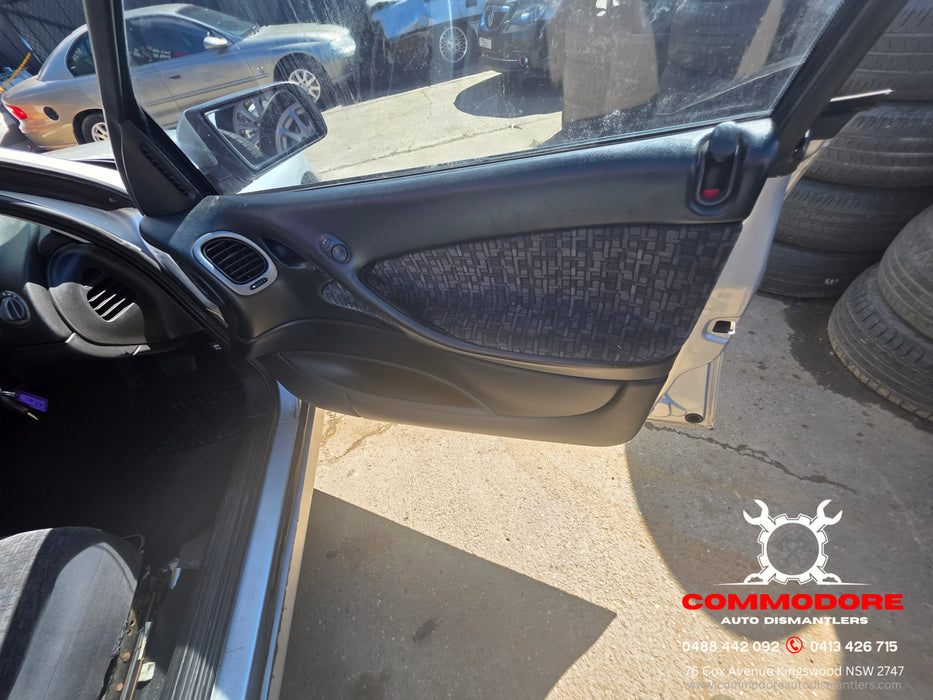 A282 - VY Holden Commodore Sedan - Triangle  Internal Mirror Cover Trim - DRIVER'S SIDE - TRIM #81i
