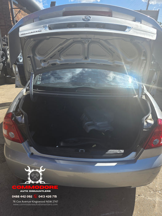 A282 - VY Holden Commodore Sedan SS - Bootlid with Wing, Brakelight, Chrome Boot Garnish and Badges - QUICKSILVER #470G