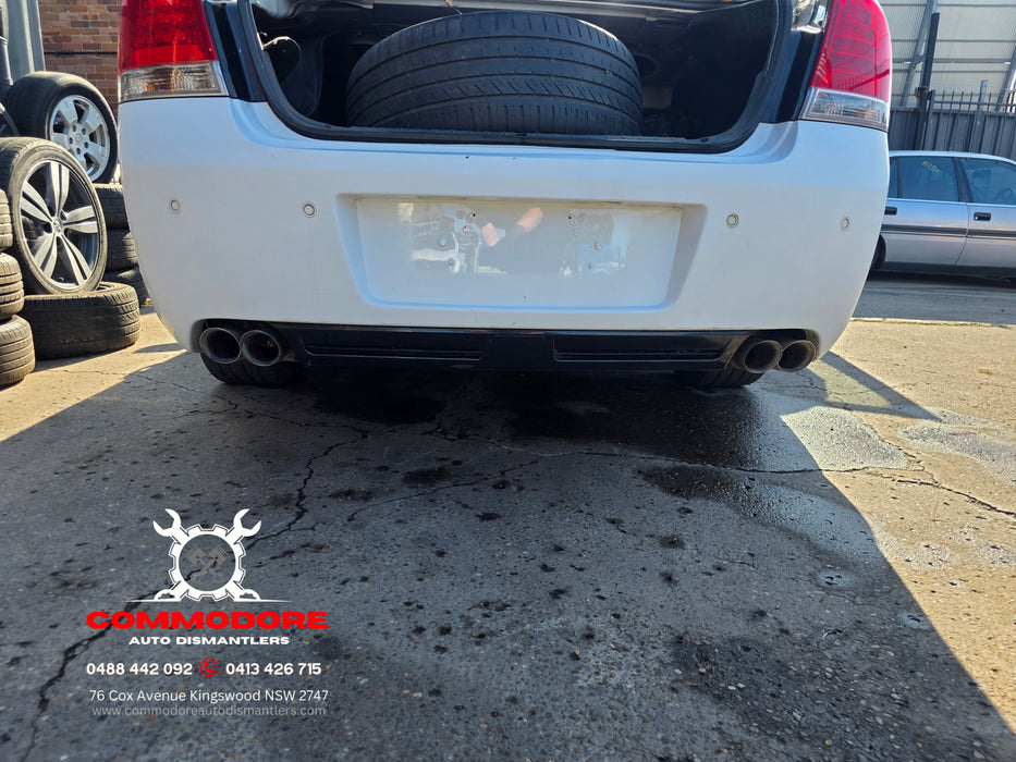 A288 - WM / WN Holden Caprice V - Rear Bar with Diffuser, Sensor and Chrome Trim - HERON WHITE #679F
