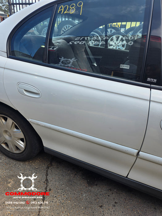 A289 - VX Holden Commodore Acclaim Sedan - DRIVERS REAR Door Heron White #JO73