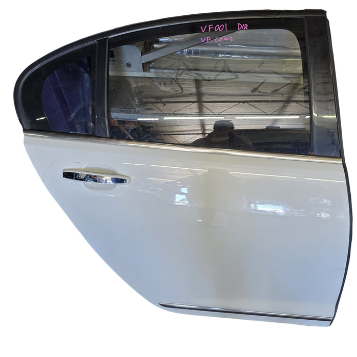 VF001 - VF Holden Calais V Sedan - Driver Rear Door with window glass, reg and ext. Door handle (POWER WINDOWS) - Heron White #679F