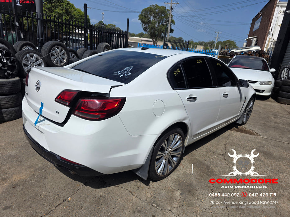A296 - VF Holden Calais Sedan V6 LFX - Fuel Flap Herron White Paint Code #679F